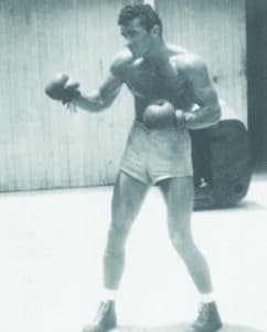 Duke, historic member of LAAC in boxing gloves